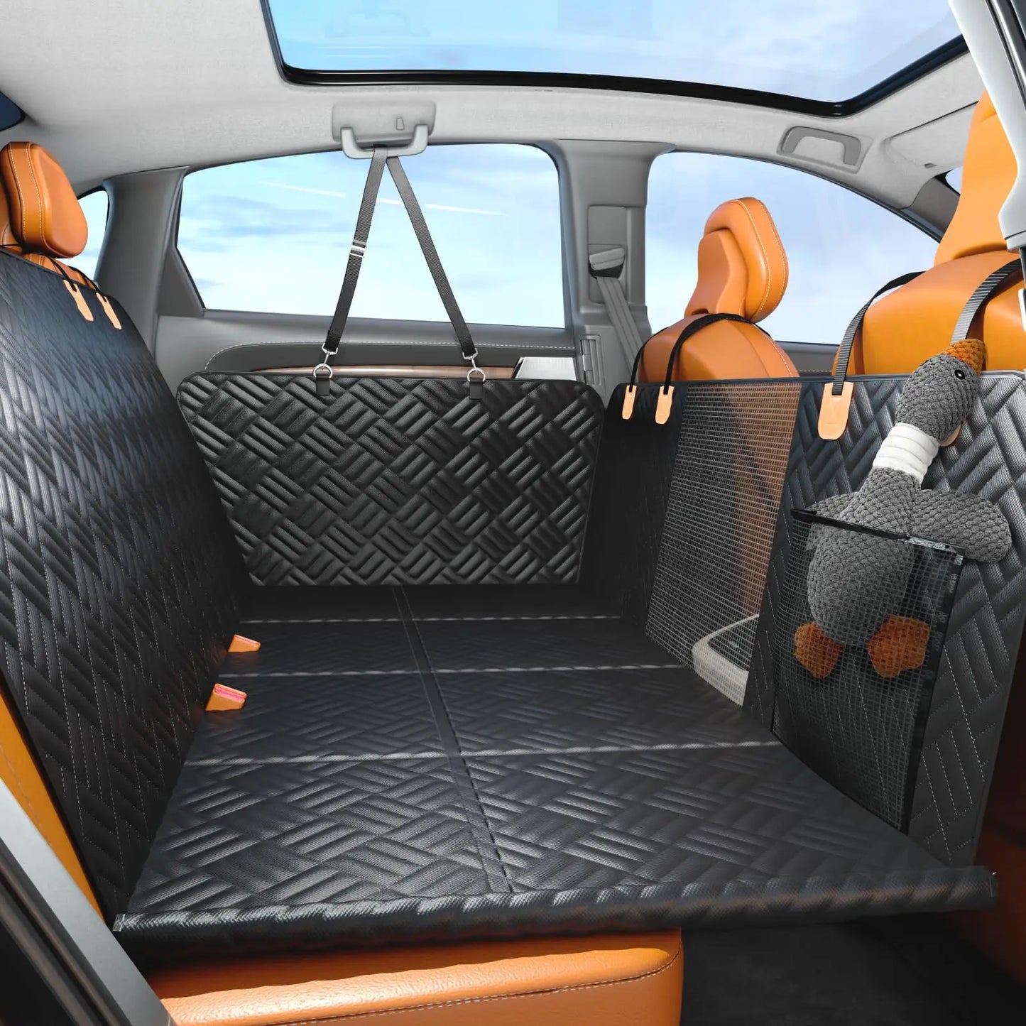 Turn your backseat into a safe, flat space for dogs with this 400‑lb load‑bearing extender + hammock.