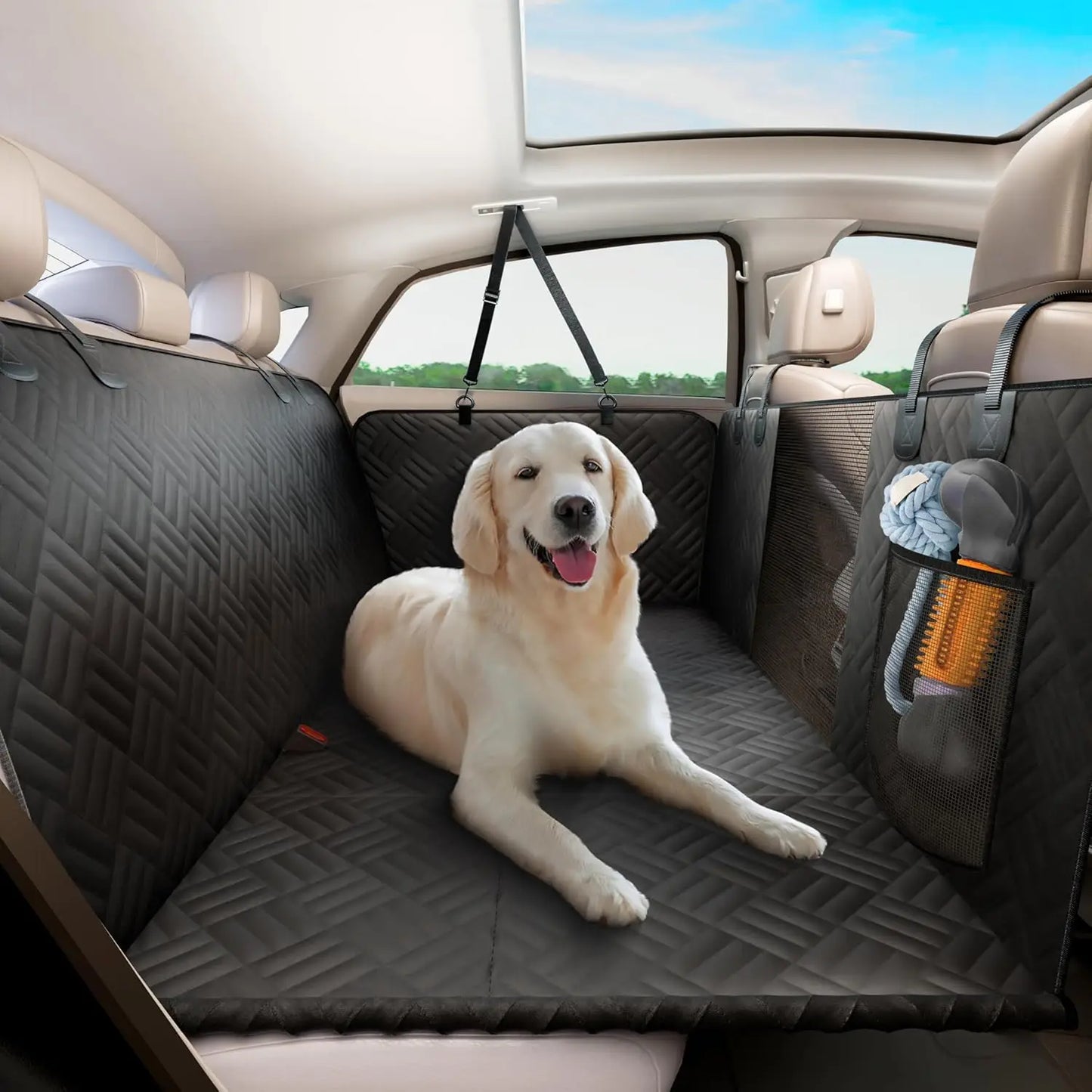 Turn your backseat into a safe, flat space for dogs with this 400‑lb load‑bearing extender + hammock.